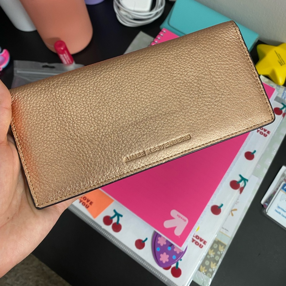Metallic pink wallet in good condition